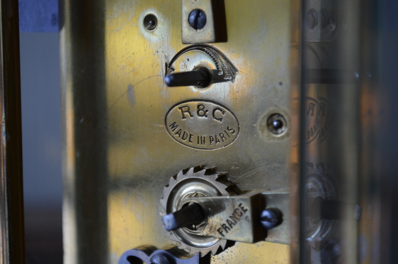 A French brass carriage clock with enamel dial and bevelled glass panels 15 cm high overall - Image 3 of 4