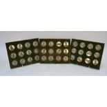 A set of 24 electroplated medallions depicting Kings and Queens of England by Thomason,