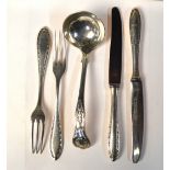 A quantity of plated table-wares, including continental dessert knives and forks, sauce boat,