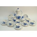 Royal Copenhagen coffee service decorated with underglaze blue flowers and foliage,