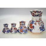 Four Masons Ironstone octagonal Imari decorated jugs, all 19th century, to/w a similar unmarked jug,