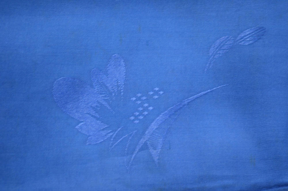 Four textiles, comprising: a small black blouse for a child, about 30cm long; two blue silk blouses, - Image 6 of 8