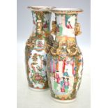 A pair of Canton famille rose vases;