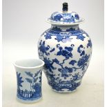 Two pieces of blue and white, comprising: an oviform vase and cover, 30cm high,