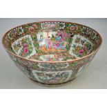 A Canton, famille rose bowl, decorated with typical panels depicting Natural History subjects,