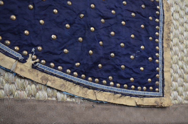 A blue-black ground leg-coat with gilt-metal studs; - Image 11 of 14