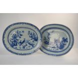 An associated pair of Chinese Export blue and white dishes; each one of oval form;