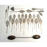 A Collection of 24 white-metal hair ornaments,
