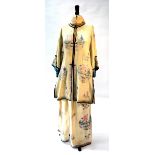A cream-white ground three piece Chinese textile suit, comprising: jacket,