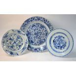 Three blue and white, Chinese Export, dishes; each one decorated with a floral design,