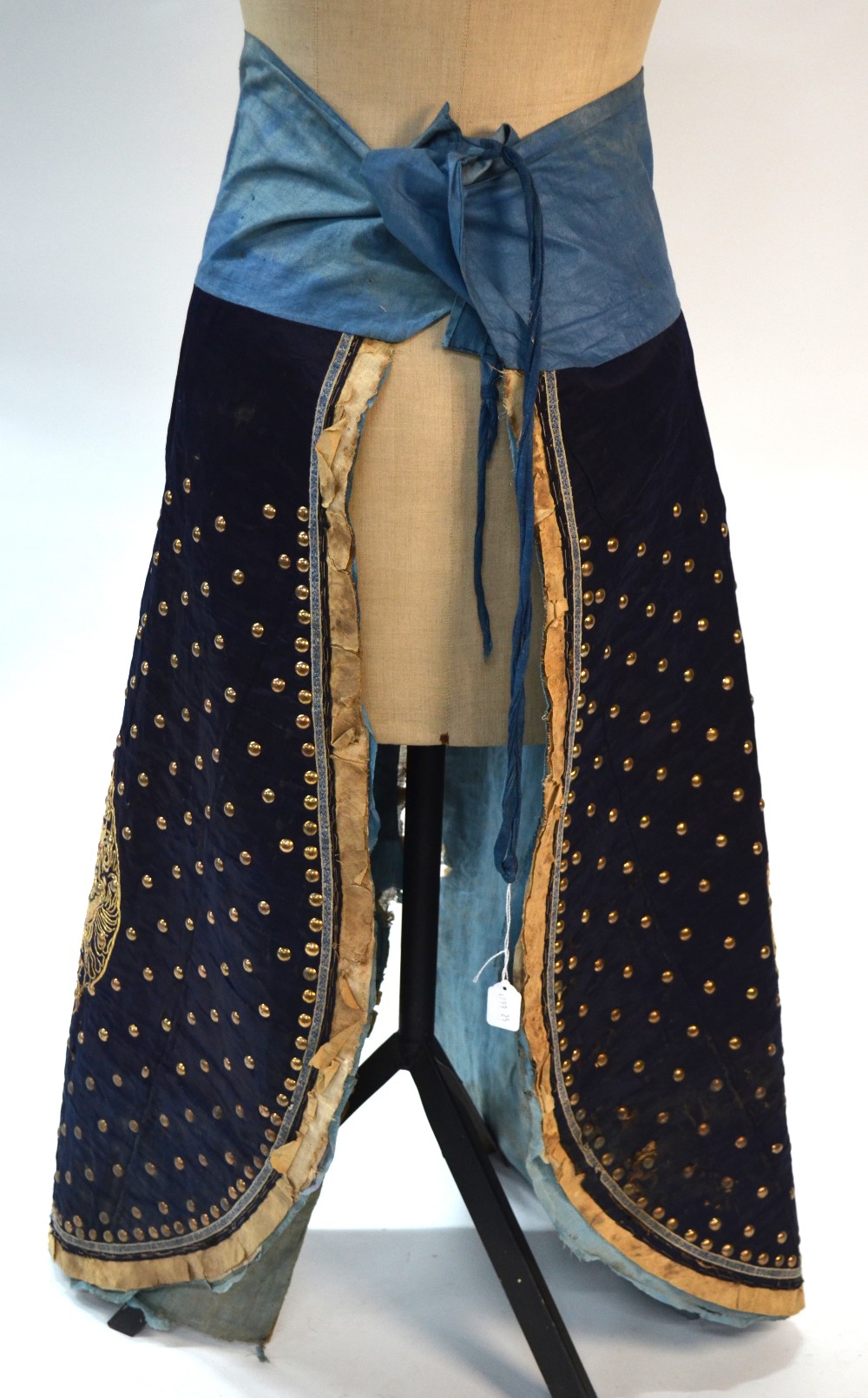 A blue-black ground leg-coat with gilt-metal studs; - Image 3 of 14