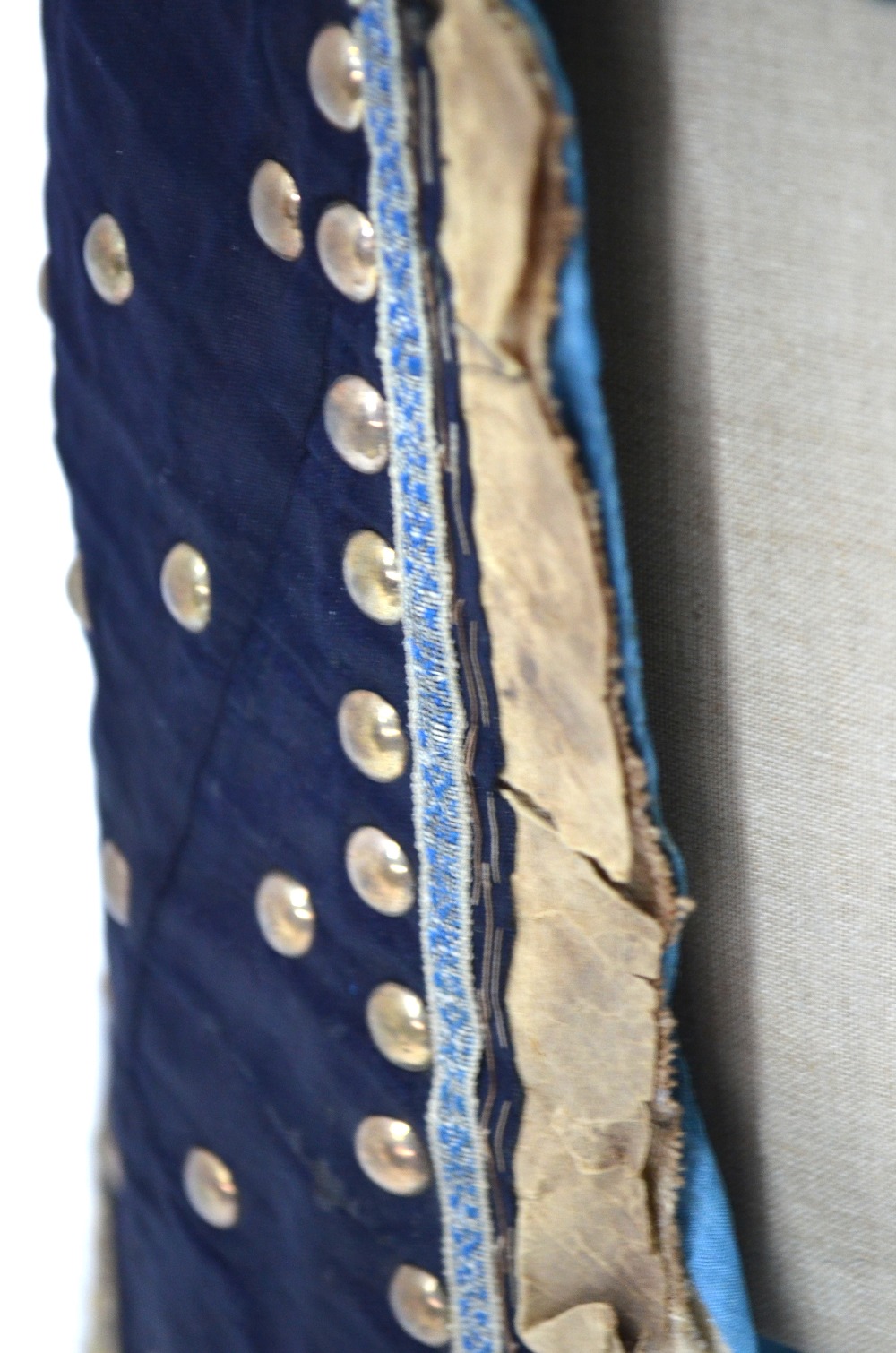 A blue-black ground leg-coat with gilt-metal studs; - Image 6 of 14