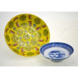 A small famille rose dish, decorated on the Imperial-yellow ground with shou symbols,