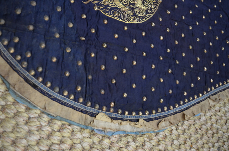 A blue-black ground leg-coat with gilt-metal studs; - Image 12 of 14