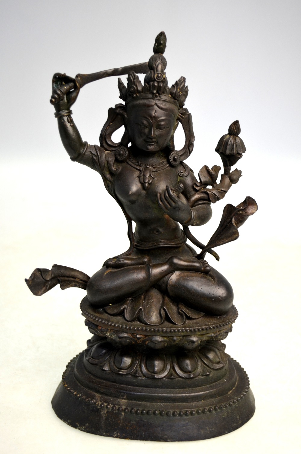 A Tantric figure of a Deity, seated in dhyanasana on a lotus base, - Image 8 of 8