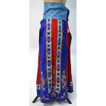 A silk and gilt thread skirt, decorated with floral designs and shou symbols,