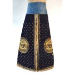 A blue-black ground leg-coat with gilt-metal studs;