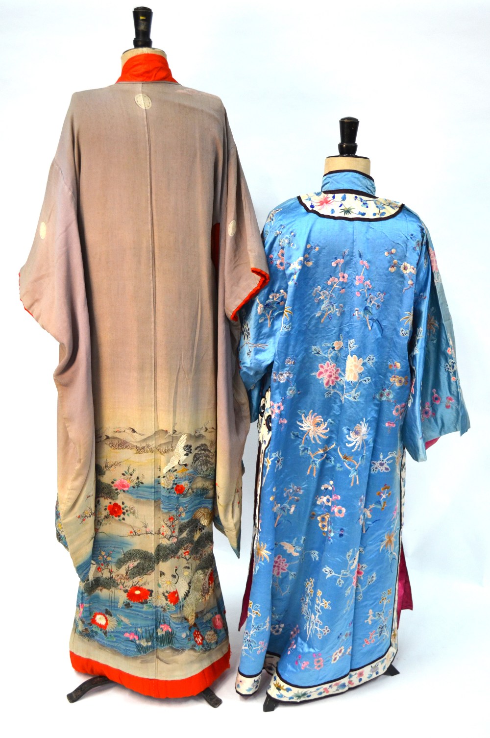 A Chinese blue silk robe embroidered with flowering prunus, japonica and tree peonies, - Image 3 of 8