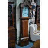 A Victorian cross-banded oak longcase cl