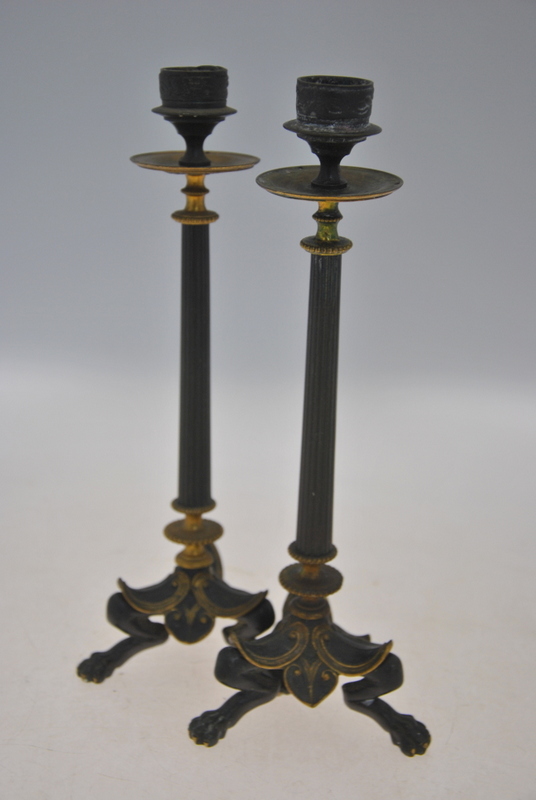A pair of Empire style gilt and brown pa
