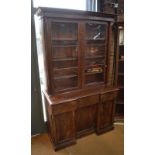 An early Victorian mahogany inverted breakfront library bookcase,