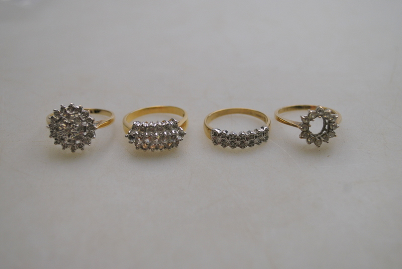 Four various cluster rings, two diamond