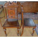 A pair of Victorian oak hall chairs havi