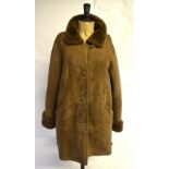 A mid-brown fitted sheepskin coat, 53 cm across chest,