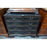 A Georgian style polychrome and ebonised serpentine chest of two short over three long graduated