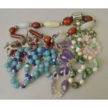 A collection of stone and other beads including turquoise and freshwater pearl, rose quartz,