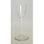 A 19th century cordial glass having a pointed funnel bowl, opaque twist stem,