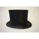 A vintage black silk top hat, size 7, 19.