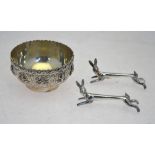 An Indian unmarked metal sugar basin, with chased decoration featuring temple dancers,