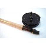 A Ryobi Challenge 11ft carbon fly rod,