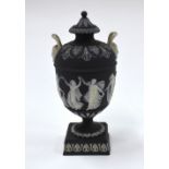 A 19th century Wedgwood black jasper oviform vase and cover,