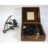 A Kelvin & Hughes Britannia series sextant with silvered scale and battery-operated night-light,