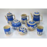 A collection of Copeland Spode jasper wares comprising two hot water jugs, milk jug, two teapots,