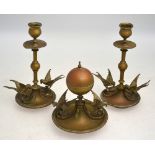 A 19th century Continental brass three piece inkwell garniture set with spherical inkwell flanked