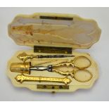 A French ivory necessaire pocket-case, containing an 18k thimble, needle-case, bodkin,