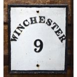 A painted cast iron sign 'Winchester 9' (miles),