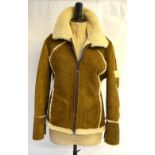A vintage 1970s sheepskin fitted jacket with zip fastening to front and pocket detail on left