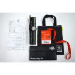 A 2006 FIFA World Cup Germany Official Hospitality sack, containing souvenir watch, wallet,