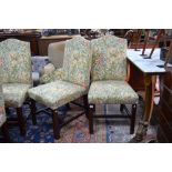 A set of eight Georgian style high backed mahogany framed dining side/hall chairs,
