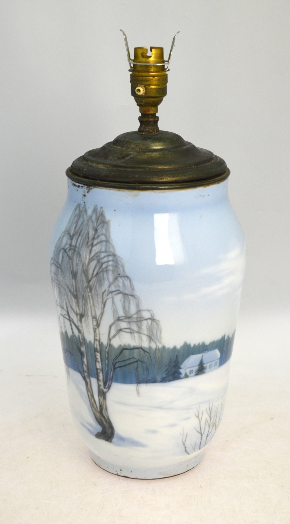 A Royal Copenhagen vase decorated with a house in a wintry landscape, 25.