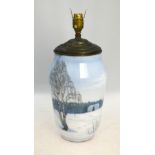 A Royal Copenhagen vase decorated with a house in a wintry landscape, 25.