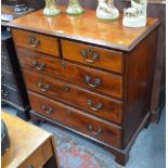 A George III satinwood banded mahogany chest of two short over three long graduated drawers,