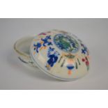 A famille rose and underglaze blue decorated circular box and cover; 6.