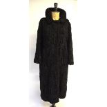 A vintage black Persian lamb full-length coat,