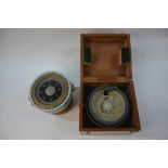 A CMB Compass no 124, painted in battleship grey, 18 cm mounted on gimbals in teak box,