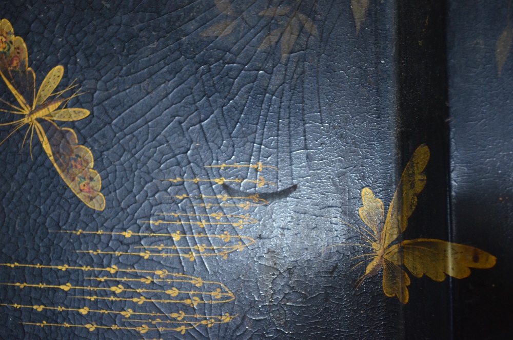 A 19th Century papier mache tray with gilt decoration of insects and flowers on a black ground. - Image 2 of 6